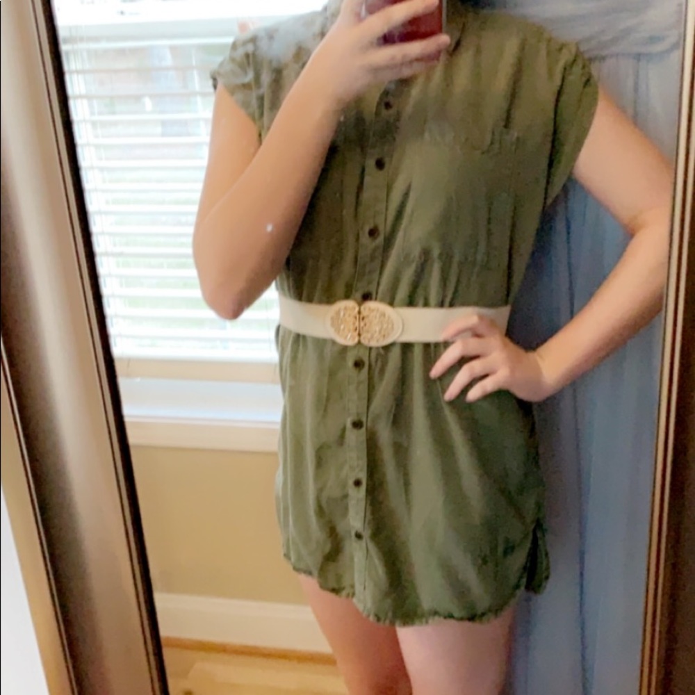 Short green dress.